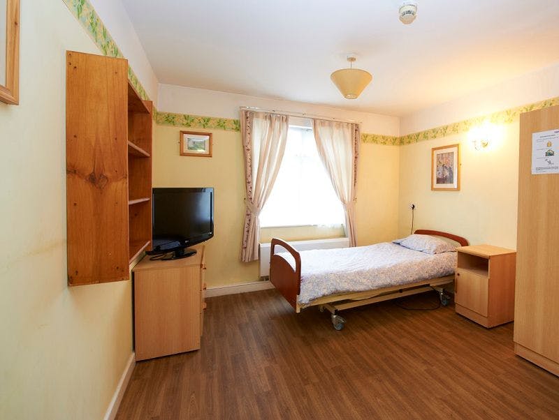 Bedroom of Paisley Court care home in Liverpool, Merseyside