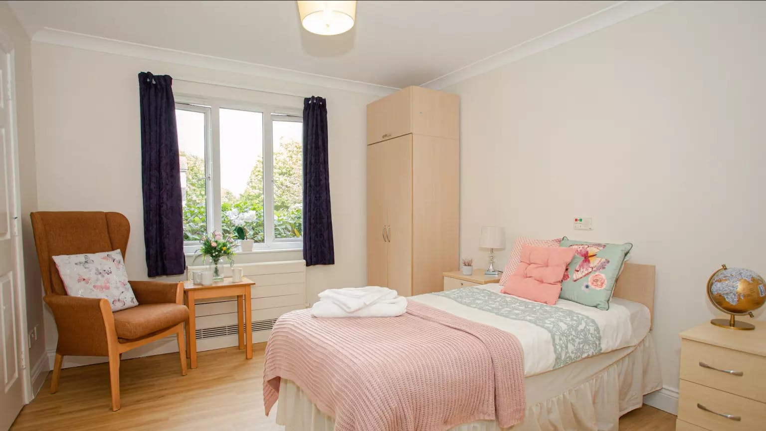 Bedroom of Pinewood Lodge care home in Watford, Hertfordshire