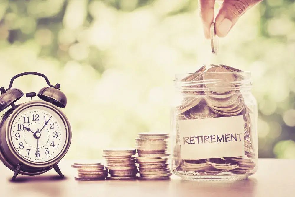 Retirement money pot and clock