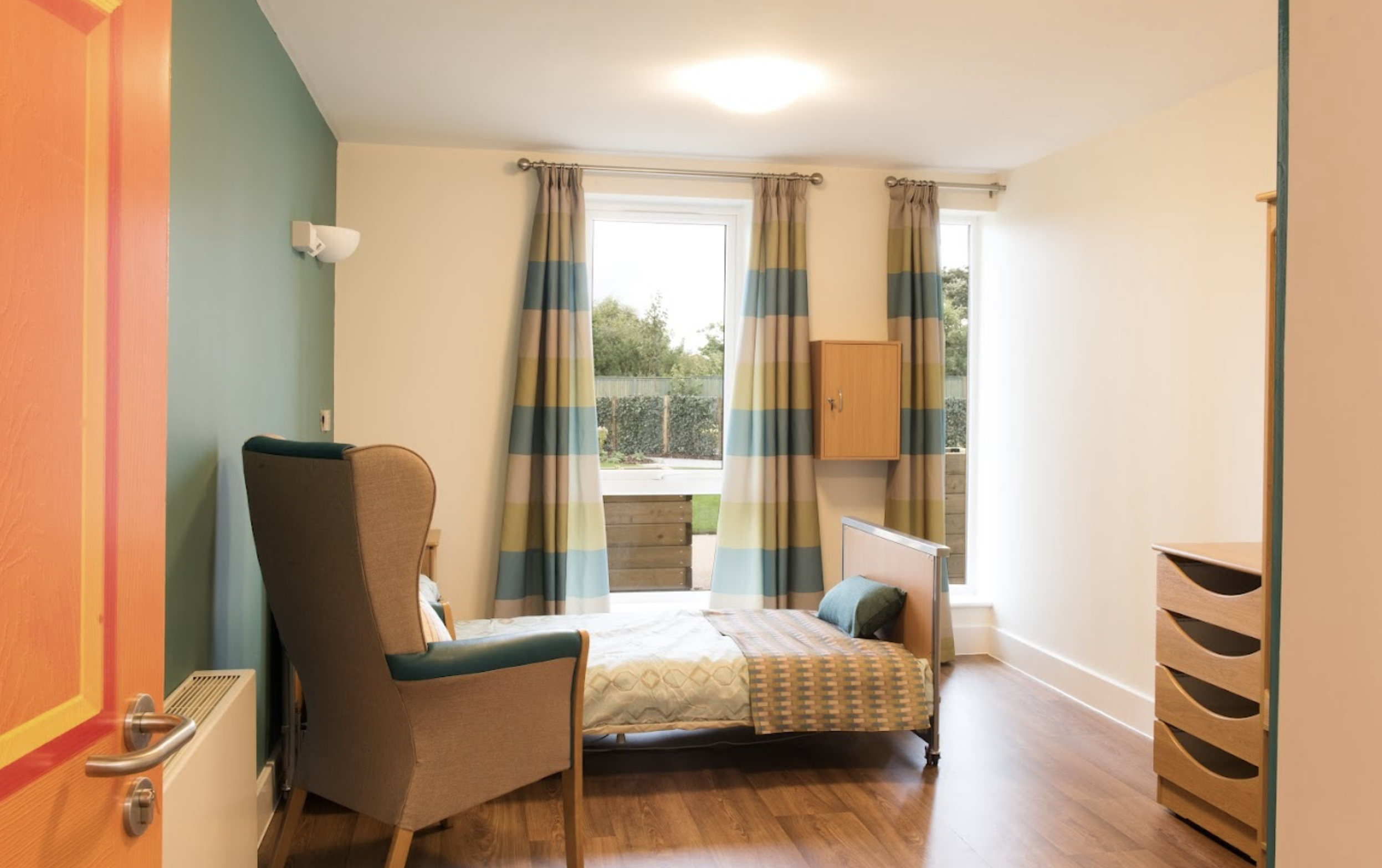 Bedroom of Ty Cariad care home in Cae Eithin, Abergele