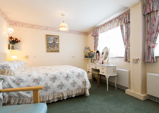 BEdroom of Pinewood care home in Chigwell, Essex