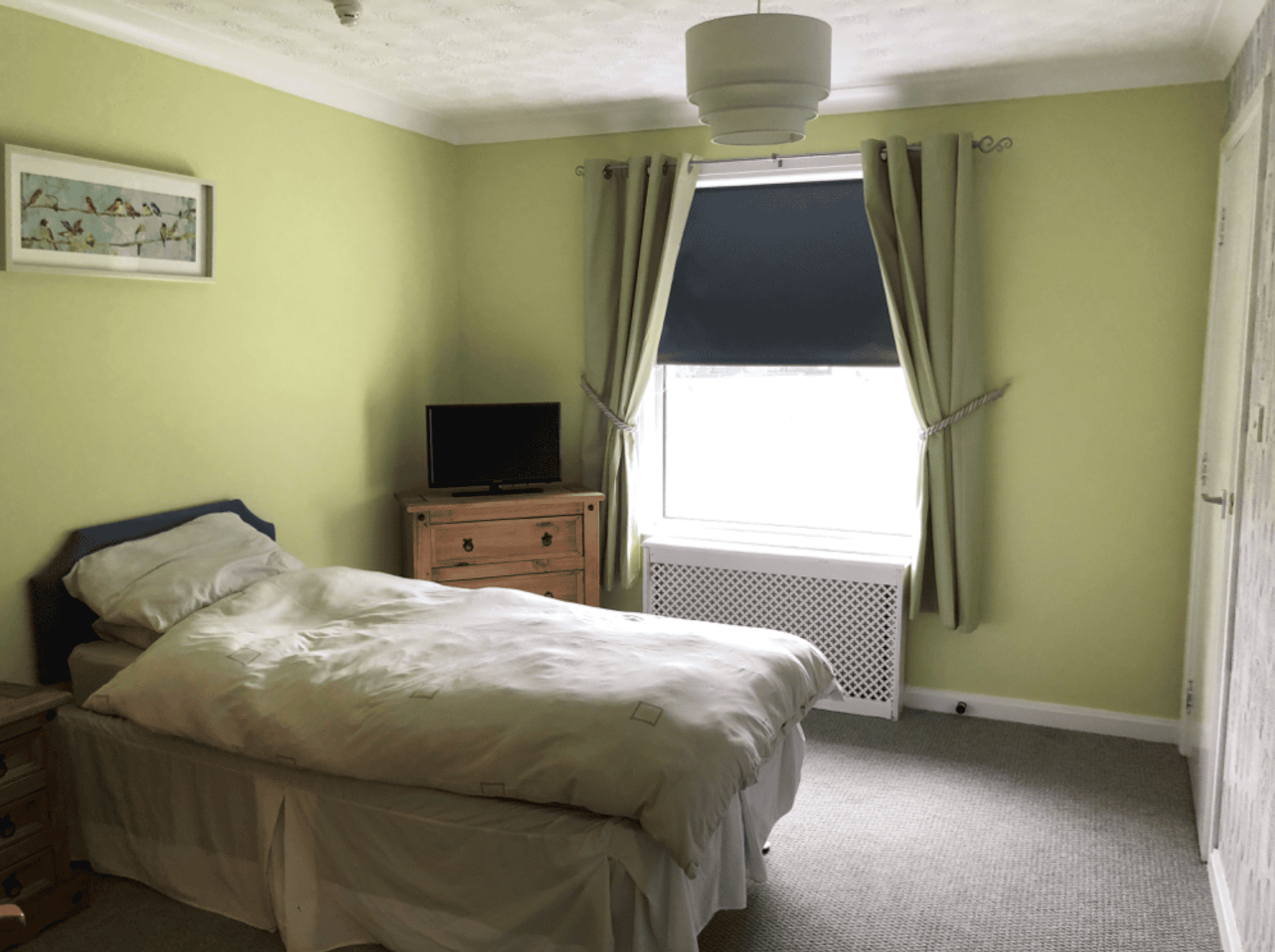 Bedroom of Glebe House Care Home in Ayr, South Ayrshire