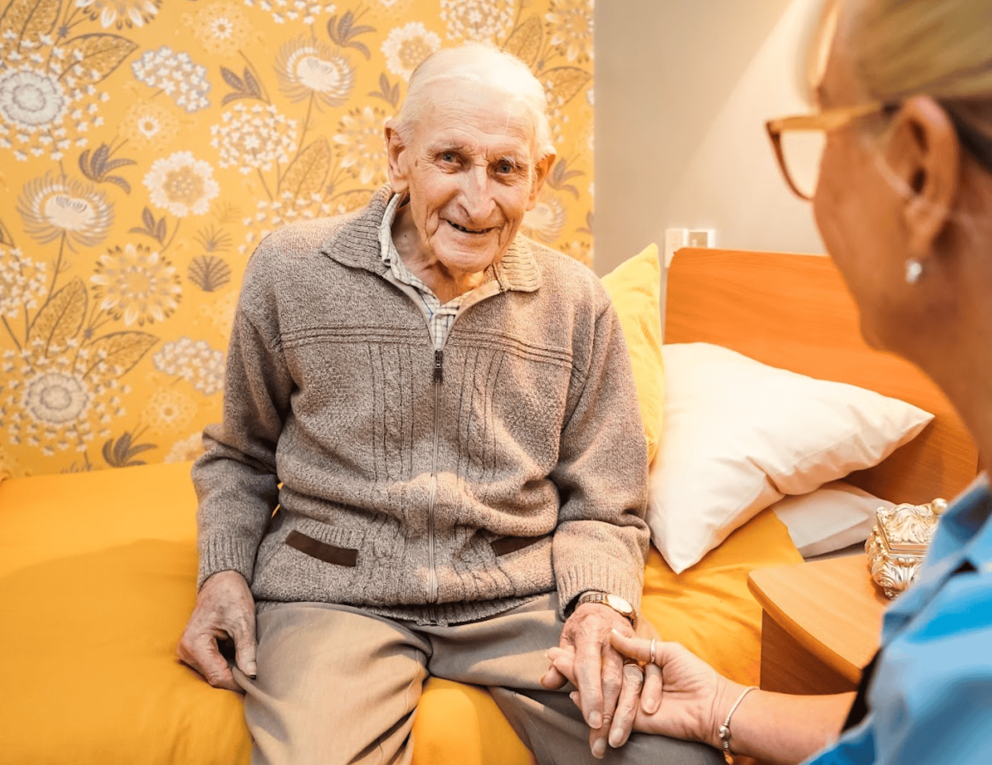 Resident in bedroom at Newgate Lodge Care Home, Mansfield, Nottingham