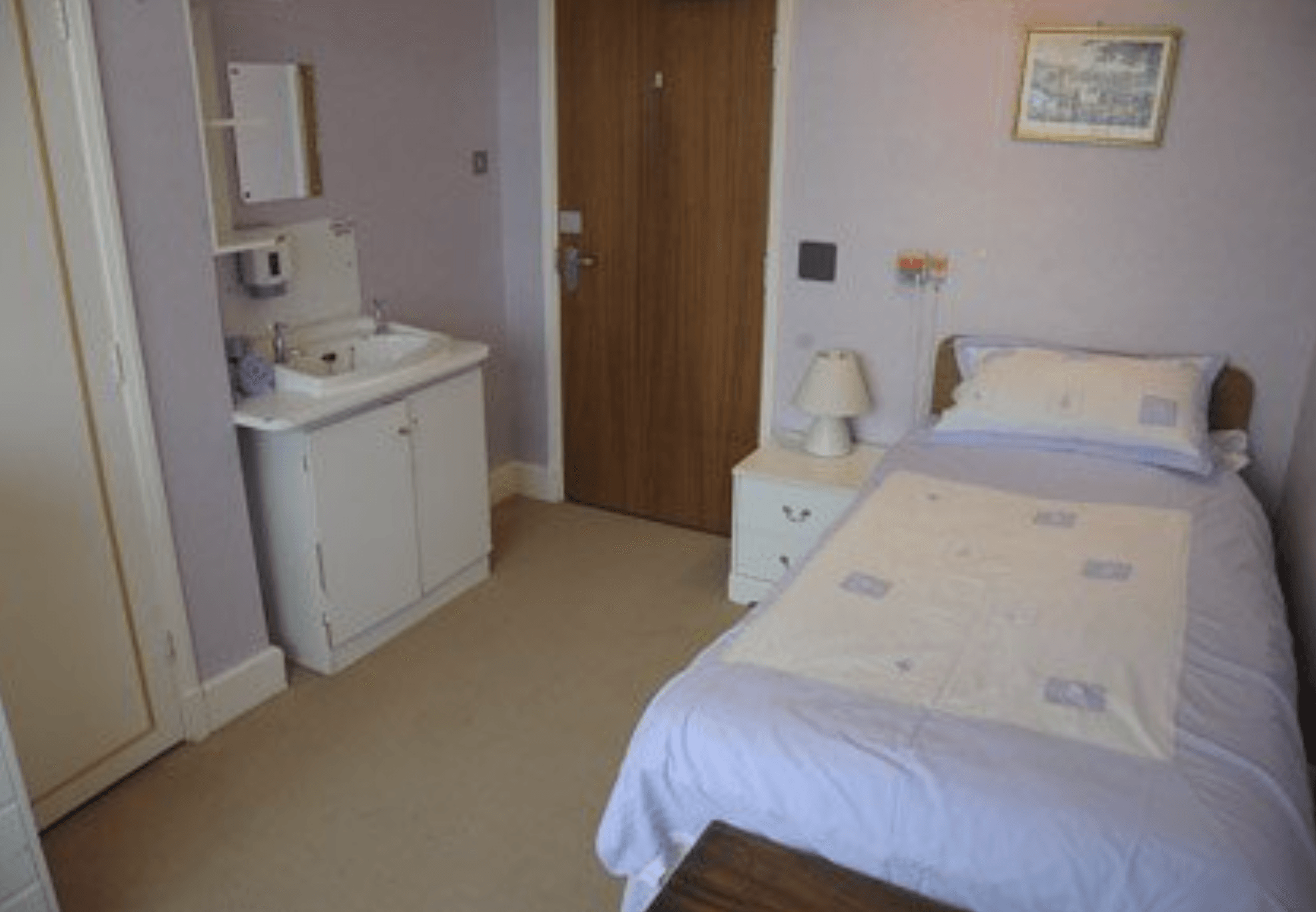 Bedroom of Harvey House care home in Leicester