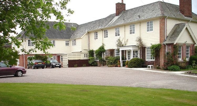 Exterior of Evendine House care home in Colwall, Malvern