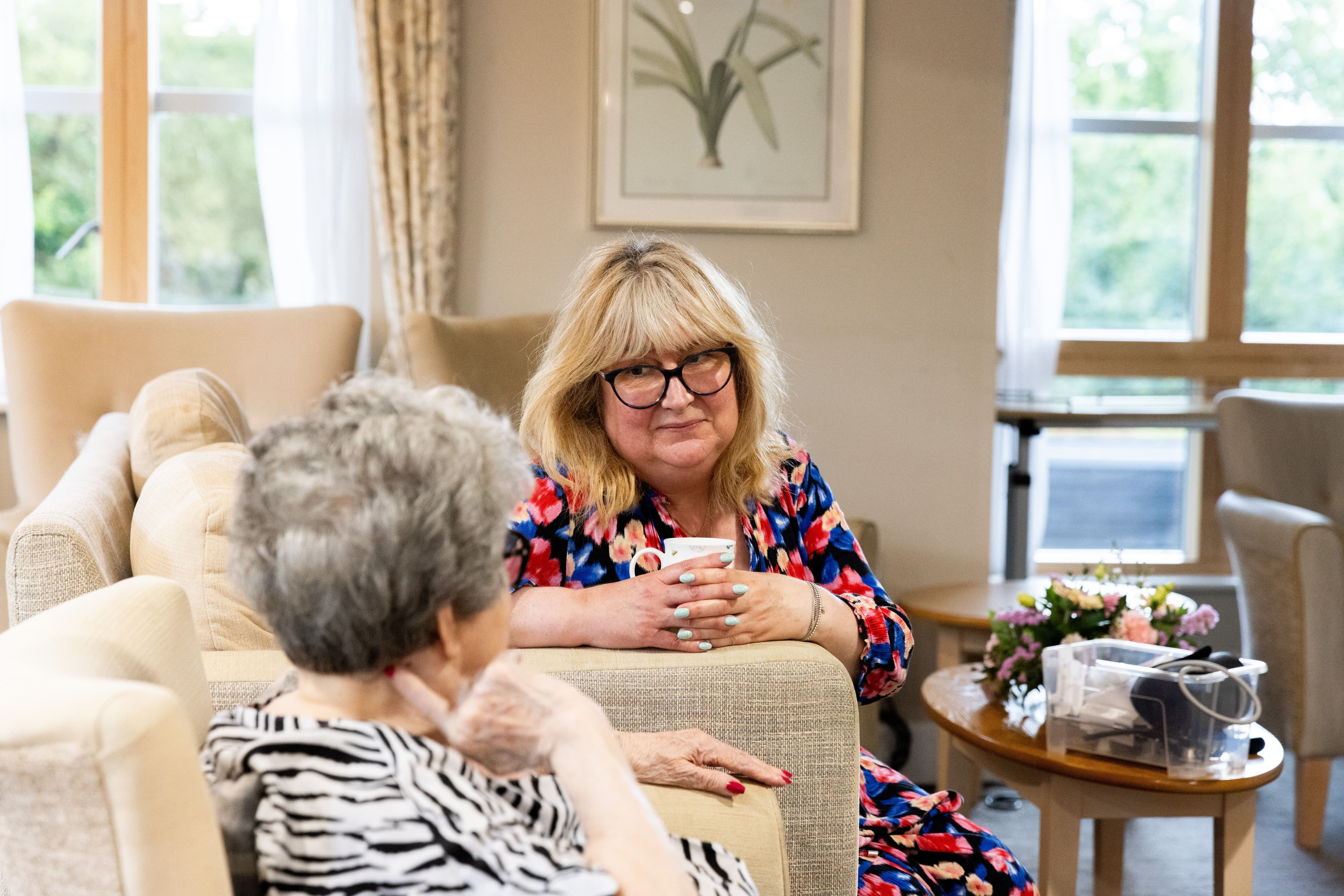 Long term care home staff with resident